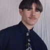 muška frizura iz 70-ih